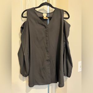 Chico’s open shoulder black blouse.  Very comfortable. Great condition.